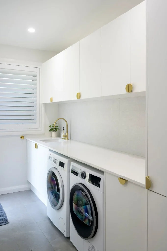 White laundry with front-loading washer and dryer